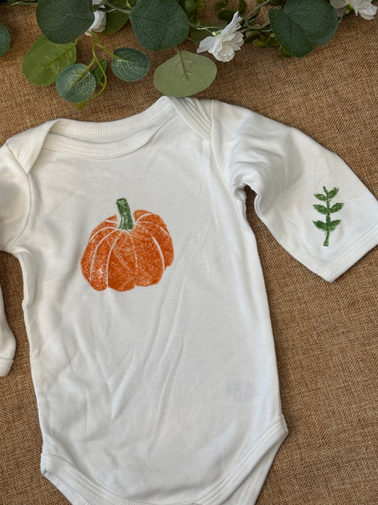 Pumpkin hand printed baby grow