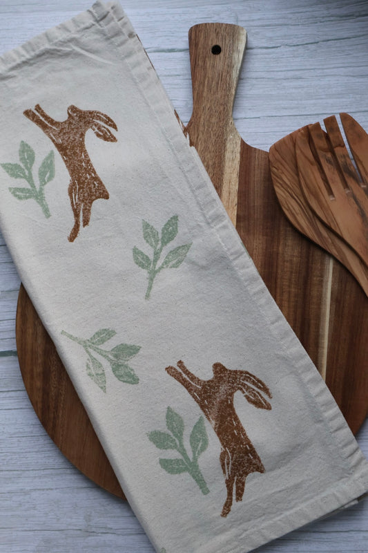 Autumn Jumping Hares Tea Towel