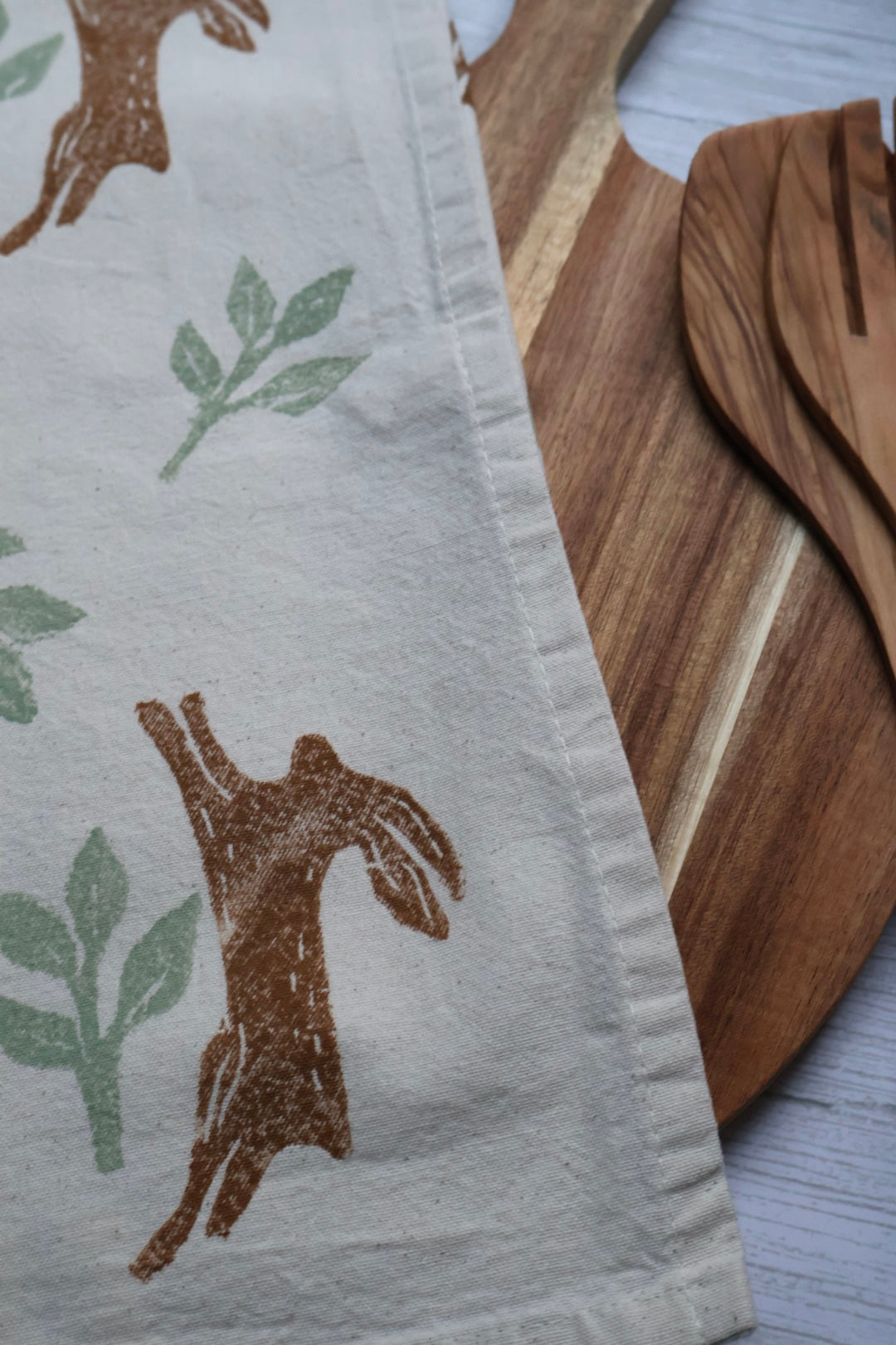 Autumn Jumping Hares Tea Towel