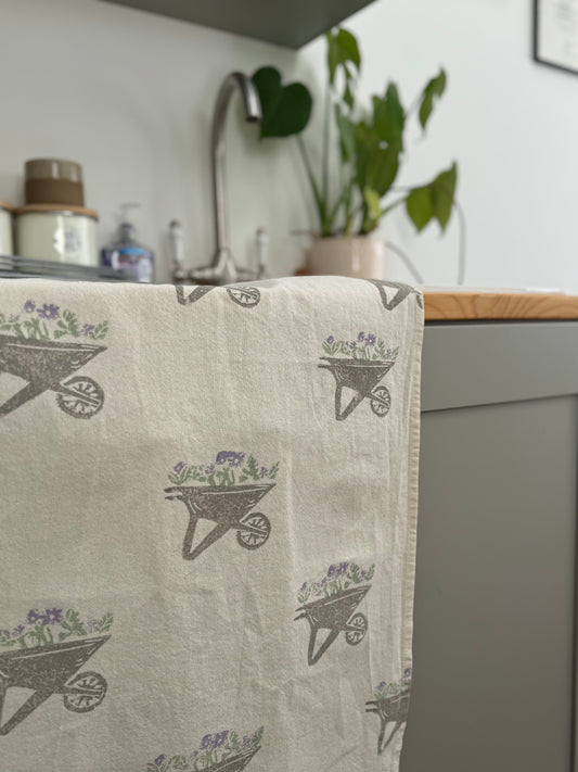 Gardening flowers tea towel