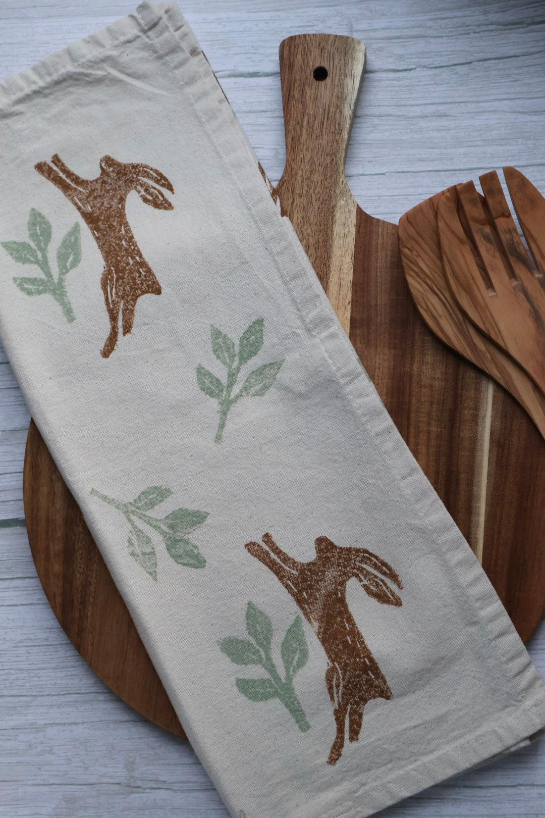 Autumn Jumping Hares Tea Towel